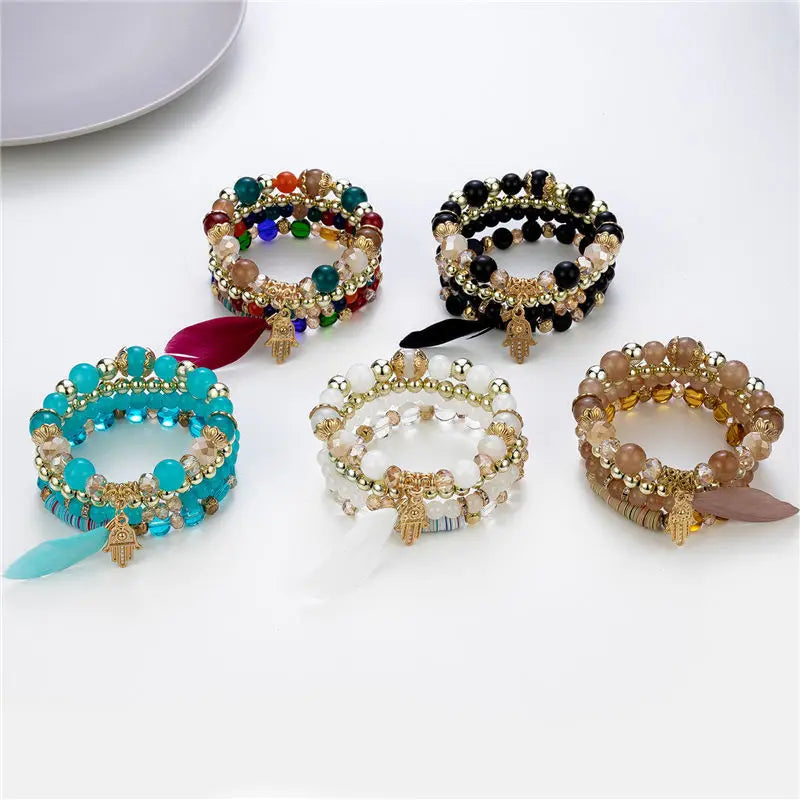 Cross-border European and American supply Bohemian bracelet four-piece set, colored crystal bead bracelet, feather hand jewelry,