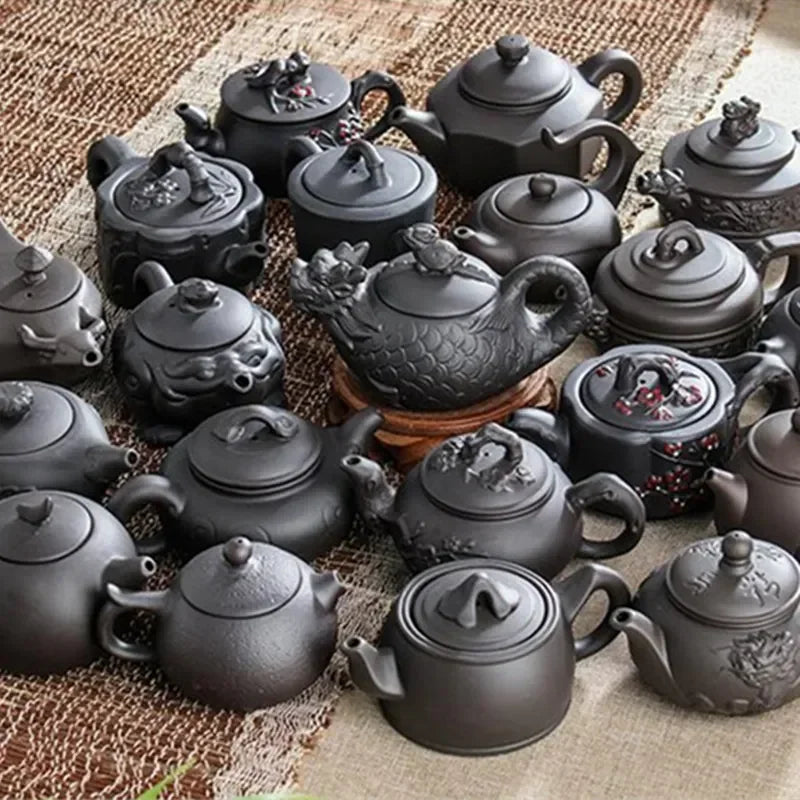 Purple Clay Teapot Small Capacity Plum blossom Teapot Small Ball Hole Filter Teapot Ceramic Household Kungfu Tea Set